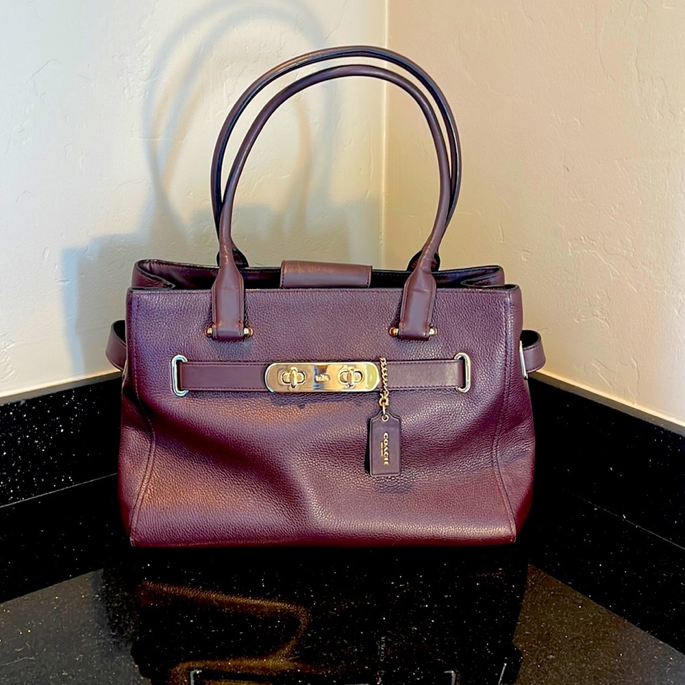 Large maroon coach purse